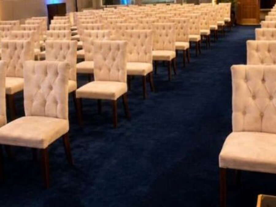 Tufted event chairs rows